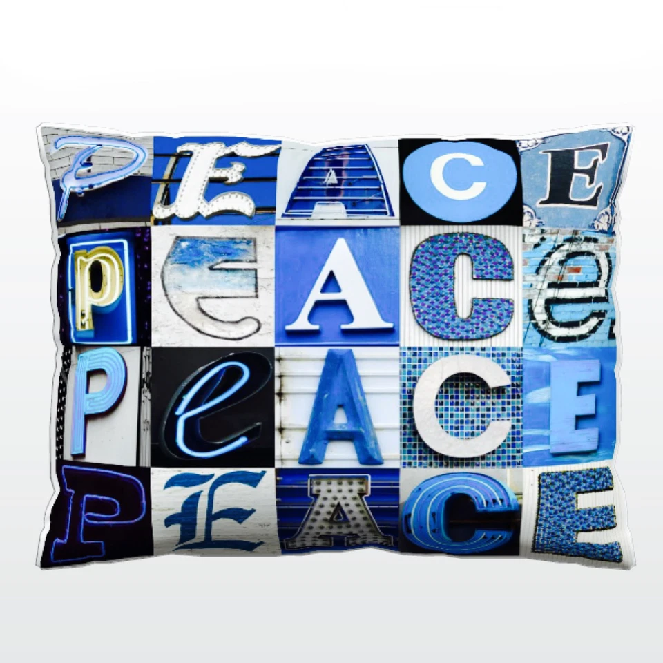 Holiday Pillow featuring the word PEACE in photos of BLUE sign letters - Image 1 of 1