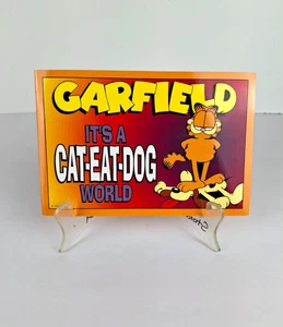 GARFIELD: IT'S A CAT-EAT-DOG WORLD by Jim Davis (1996, Ballantine) Paperback - Picture 1 of 5