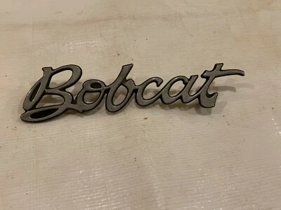 Mercury Bobcat 1975-1978 guardabarros emblema insignia guión logotipo adorno Foto 1 de 4