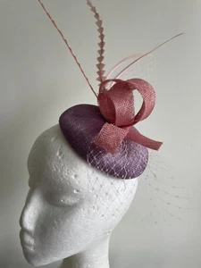 Lilac fascinator with round base and pink loops, netting and feathers - Picture 1 of 5