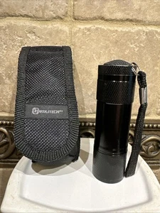 MINI TORCIA LED NERA PORTATILE IN ALLUMINIO con CORDINO E CUSTODIA - Foto 1 di 10
