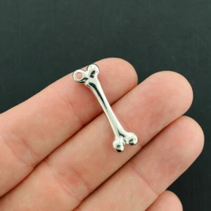 4 ciondoli osso tono argento femore 2 lati - SC7852 - Foto 1 di 1