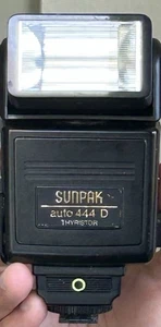 Flash tiristor negro SUNPAK Auto 444 D Nikon F-3 FE-FE-2 FG-FA-EM - Imagen 1 de 10