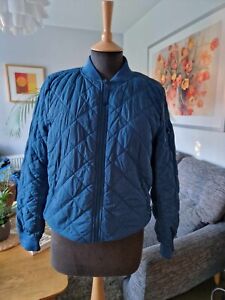 Faux-fur lined blue quilted M&S jacket, size 10