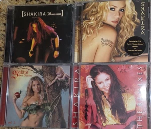 Shakira 4 CD LOT - The Remixes, MTV Unplugged, Laundry Service, Oral Fixation. - Foto 1 di 2