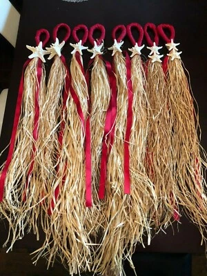 Perchas para sillas estrellas de mar para boda temática playa  Foto 1 de 4