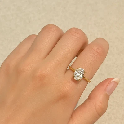 Anillo de compromiso de diamantes de corte ovalado de 1,20 quilates enchapado en oro de 14 k de plata 925 Foto 1 de 4