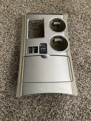 08-13 TOYOTA HIGHLANDER FRONT CENTER SHIFTER BEZEL CUP HOLDER Silver Tan - Image 1 of 4