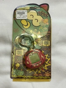 Neu Dinkie Dino RakuRaku Dinokun elektronisches virtuelles Haustier rot TK-910 - Bild 1 von 3