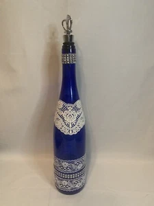 Cobalt Blue Decorative Bottle With Lace Bling And Silver Wine Stopper - Picture 1 of 11