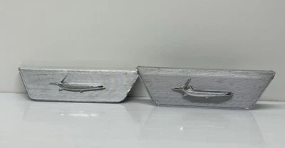 Lot 2 Plymouth Barracuda 1967, 1968, 1969 Rear Seat Back Trim Emblem OEM 2839108 - Image 1 of 4