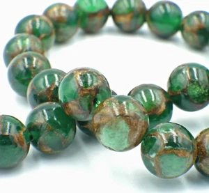 NELLYS grüne Jade mit Goldfluss 4-10mm 1 Strang Perlen Kugeln Edelsteine