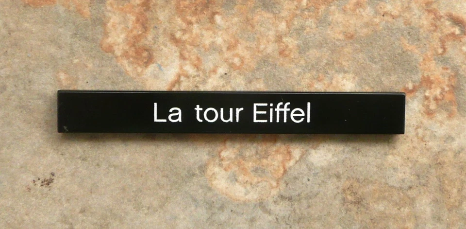 LEGO part 4162pb107 BLACK 1x8 La tour Eiffel Print from Set 21019 - Image 1 of 1