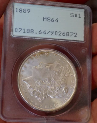 MORGAN SILVER DOLLAR 1889 PCGS MS 64++++ OLD RATTLER MAJOR UNDER GRADE - Image 1 of 4