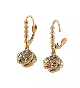 Pendientes con nudo de amor de oro amarillo y blanco de 14k - Imagen 1 de 13