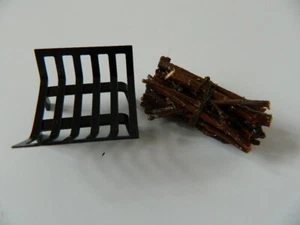 (HP25) 1/12th scale DOLLS HOUSE METAL FIRE GRATE WITH SEPARATE LOG PILE (TIED) - Picture 1 of 4