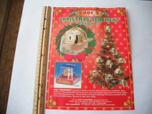 CÓDIGO 3 COLECCIONABLES 1998 NAVIDAD CASCO BOMBEROS ADORNO HOJA PUBLICITARIA - Imagen 1 de 4