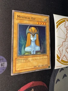 2002 YUGIOH 1ST Edition LOB-062 MYSTICAL ELF SUPER RARE Glossy NA 074๐LP +๐ - Picture 1 of 7