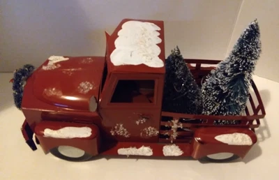 Camión rojo iluminado Felices Fiestas camión decorativo de Navidad Foto 1 de 4