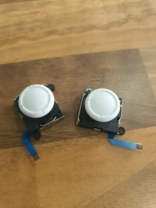 2 Nintendo Switch Joy-Con Analog Joystick - Thumb Stick Ersatz (weiß). - Bild 1 von 2