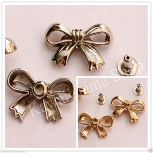 Borchie sfuse a fiocco con rivetto in lega 20*14mm colori argento / oro rosa - Picture 1 of 7