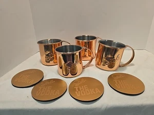 Set 4 Tazze Mule Stoli Mosca in Rame con Manici Sottobicchieri Vodka Acciaio Inox(4) - Foto 1 di 16