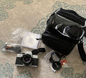 Praktica super TL 1,000 camera with lense& many accessories