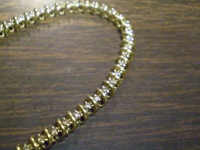 Brazalete de eslabones de tenis de 55 diamantes champán de oro amarillo de 10 quilates para dama 9,0 gramos     Foto 1 de 4