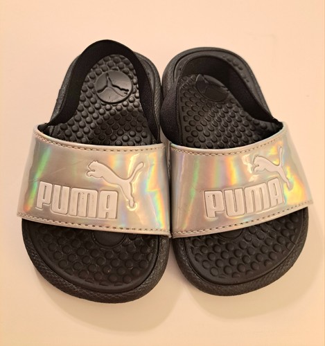 Scivoli Puma bambino argento e nero con cinturino posteriore taglia 5 in ottime condizioni