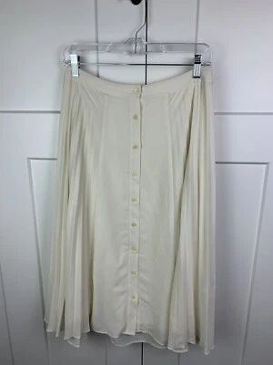 Falda midi plisada frontal Banana Republic XS 2 botones marfil academia romántica Foto 1 de 4