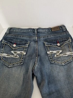 Jeans masculino camelo vermelho aba desgastada bolsos traseiros vermelho detalhes furos de botão 32×32 - Imagem 1 de 4