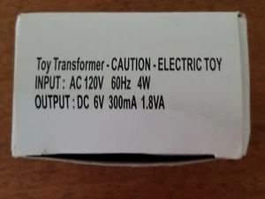 Markenloser Spielzeugtransformator (LG060030) DC 6V 300mA 1,8VA AC Adapter / Netzteil - Bild 1 von 3
