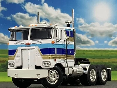 1/64 DCP WHITE/BLUE/GOLD 352 PETERBILT 86" COE - Image 1 of 4