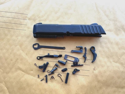 Ruger EC9s 9mm  Parts Lot - Slide, barrel rebuild / repair kit + Mystery Box - Image 1 of 4