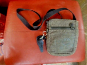 KIPLING GREY CROSS BODY BAG FOLD OVER TRAVEL BAG HOLIDAYS LOTS POCKETS GOOD COND - Picture 1 of 9