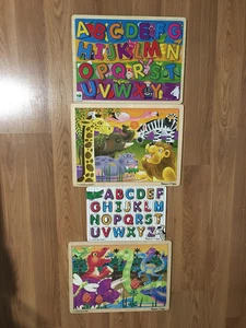 Melissa & Doug Set 3 24-teiliges Puzzle Safari Dinosaurier Alphabet plus Lernen - Bild 1 von 2