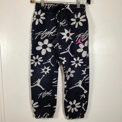 Pantalones deportivos Jordan Floral Flight para niñas talla mediana 10-14 blanco y negro Foto 1 de 4
