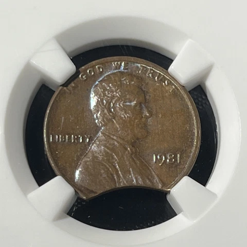 1981 1C MINT ERROR 15% CURVED CLIP NGC MS 63  PENNY BN Cover