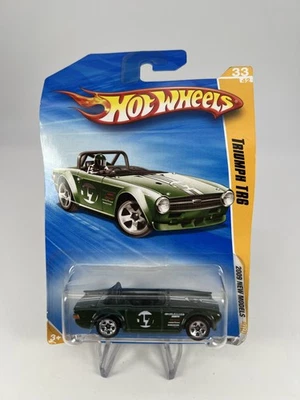 Hot Wheels #N4036 Triumph TR6 Green Race Car SEALED - Image 1 of 4