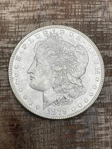1879 $1 US Morgan Silver Dollar - Picture 1 of 2