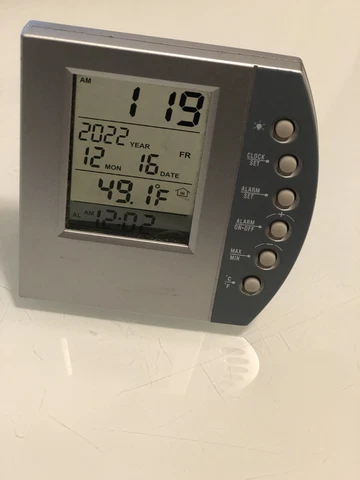 “See-Through” Alarm Clock Works thru Cover