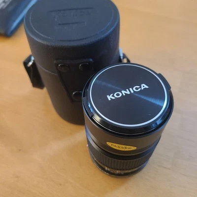 Konica Hexanon AR montura 135 mm f/3,5 MF lente capucha incorporada con estuche Foto 1 de 4