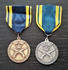 Schweden - Das Pistolenschießzeichen - Bronze und Silber Award Standardmedaille