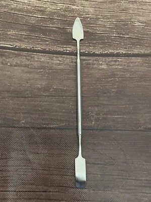 Espátula aplicadora de cera de acero inoxidable Foto 1 de 2