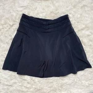Athleta Damen Everyday gewebter Skort Rock A-Linie seitlicher Reißverschluss schwarz - Größe 4 - Bild 1 von 2