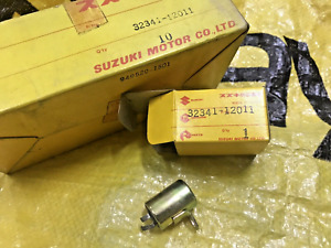Condensateur Suzuki A100 AC100 RV90 RV125 TC90 TC100 TC125 TS90 TS100 TS125 NEUF DANS NOTRE EMBALLAGE D'ORIGINE