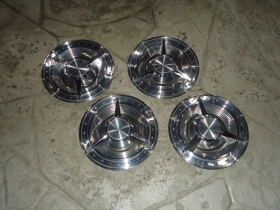 Juego de (4) Tapacubos OEM GM Tapacubos 1962 Pontiac Bonneville Motor Division Spinner Foto 1 de 4