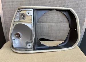 MAZDA 1977-80 FAMILIA 323 HATCHBACK GENUINE RHS KOITO SINGLE HEAD-LIGHT SURROUND - Picture 1 of 15