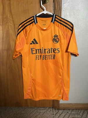Camiseta de fútbol Adidas para hombre Real Madrid 24/25 naranja visitante talla S calce ajustado Foto 1 de 3