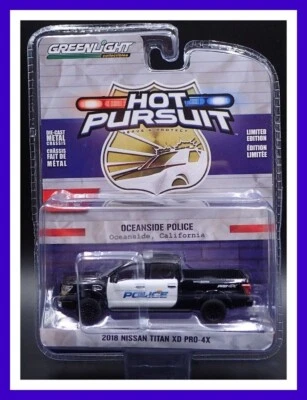 HOT PURSUIT 2018 NISSAN TITAN XD PRO-4X OCEANSIDE POLICE #42970-E DIECAST 1/64 - image 1 of 4